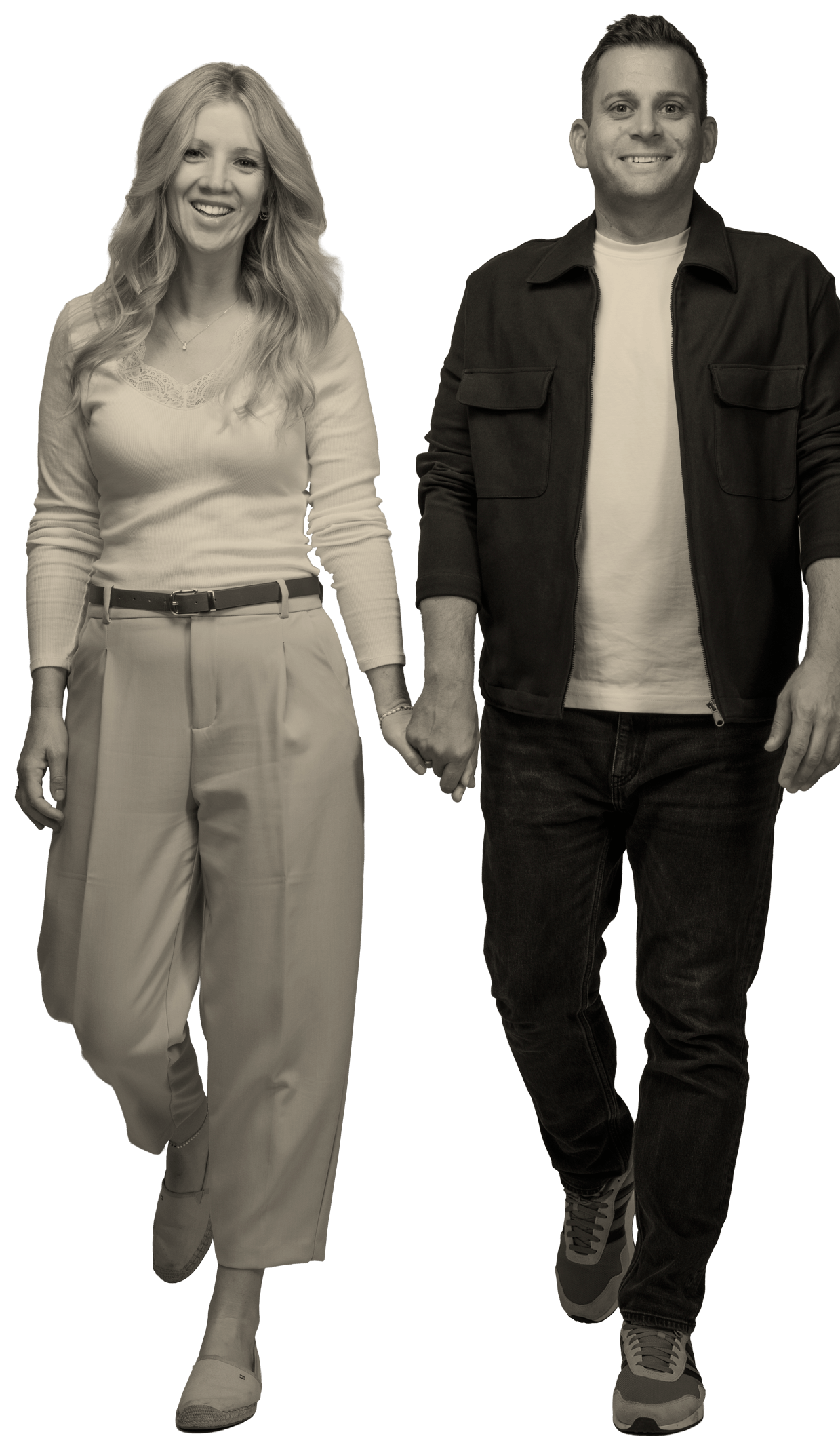 Sonja Birk-Keil und Michael Keil von OKAY Immobilien gehen Hand in Hand